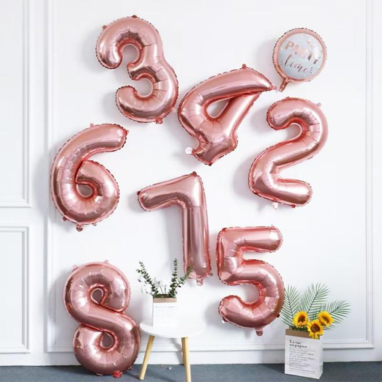 Palloncino con numeri in oro rosa